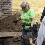 Mom hauling a bucket of dirt