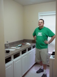 Roger finishing up the cabinets